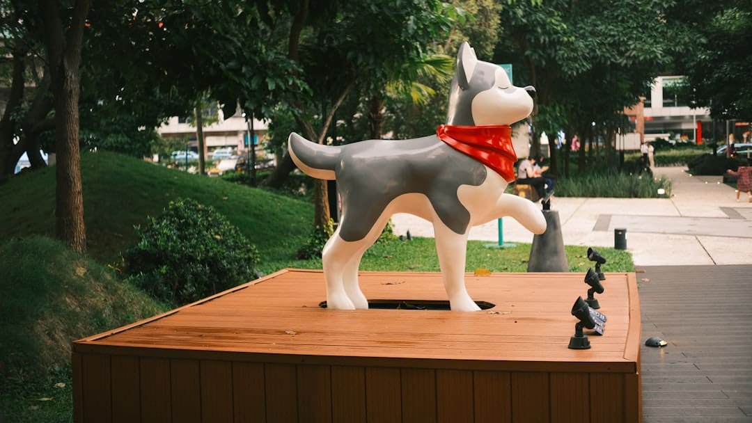 ADA complaint. A statue of a husky wearing a bandana.