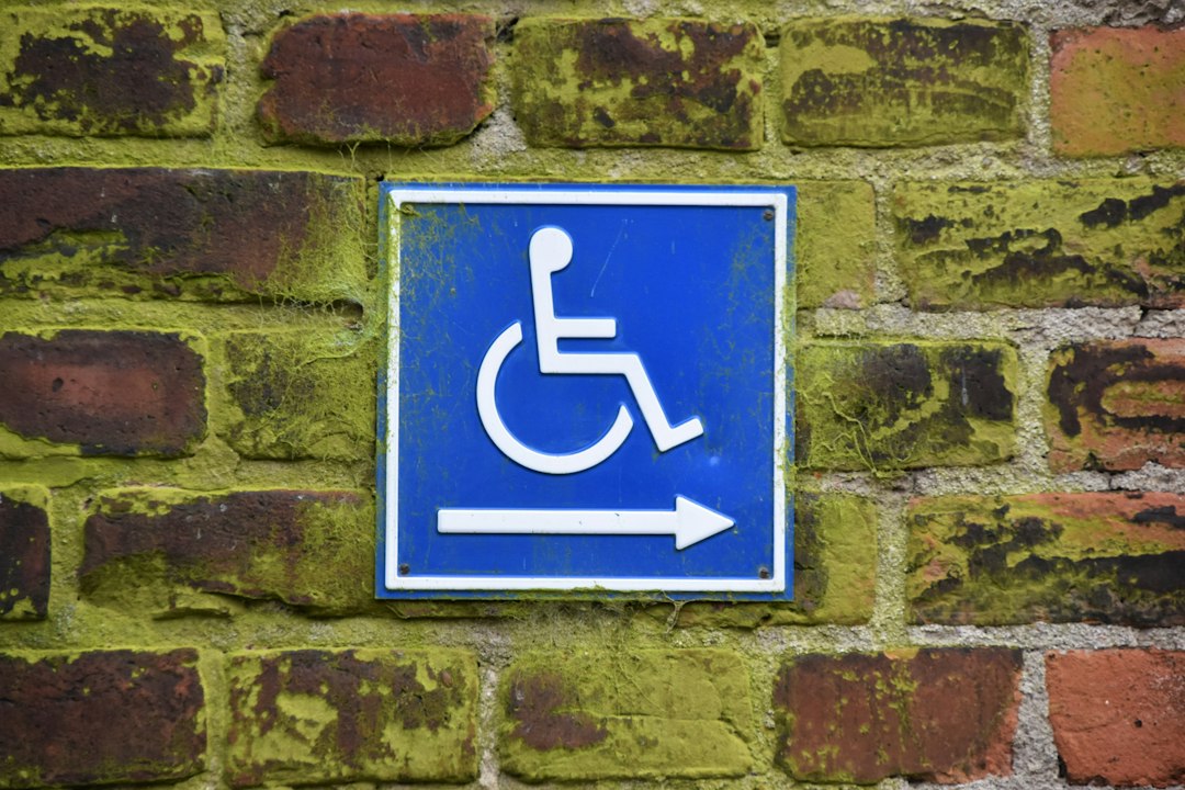 landlord dispute — PWD sign on brick wall